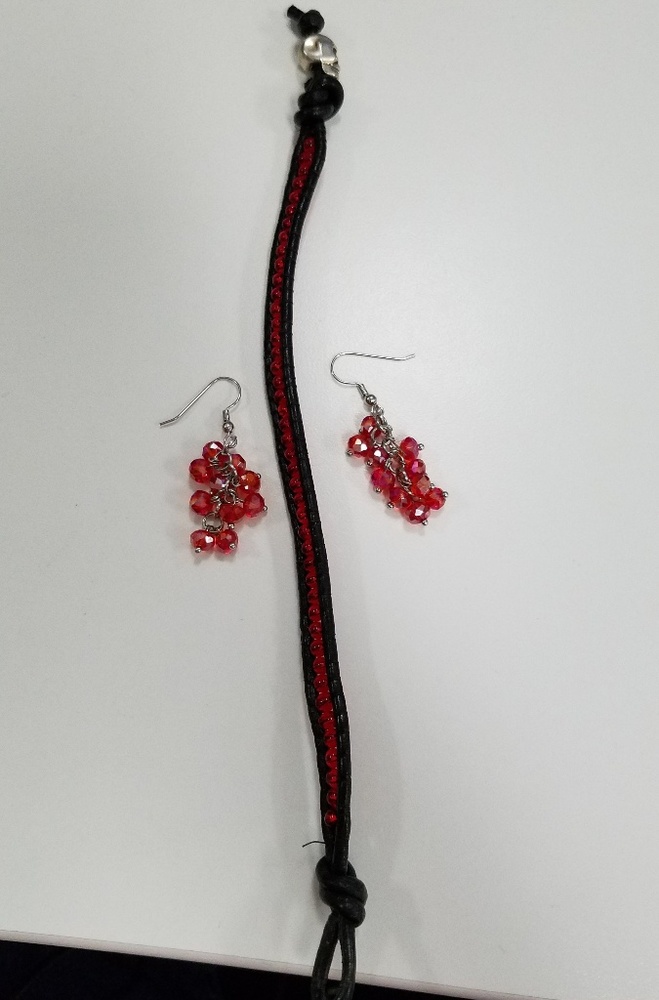 Leather bracelet with earrings.